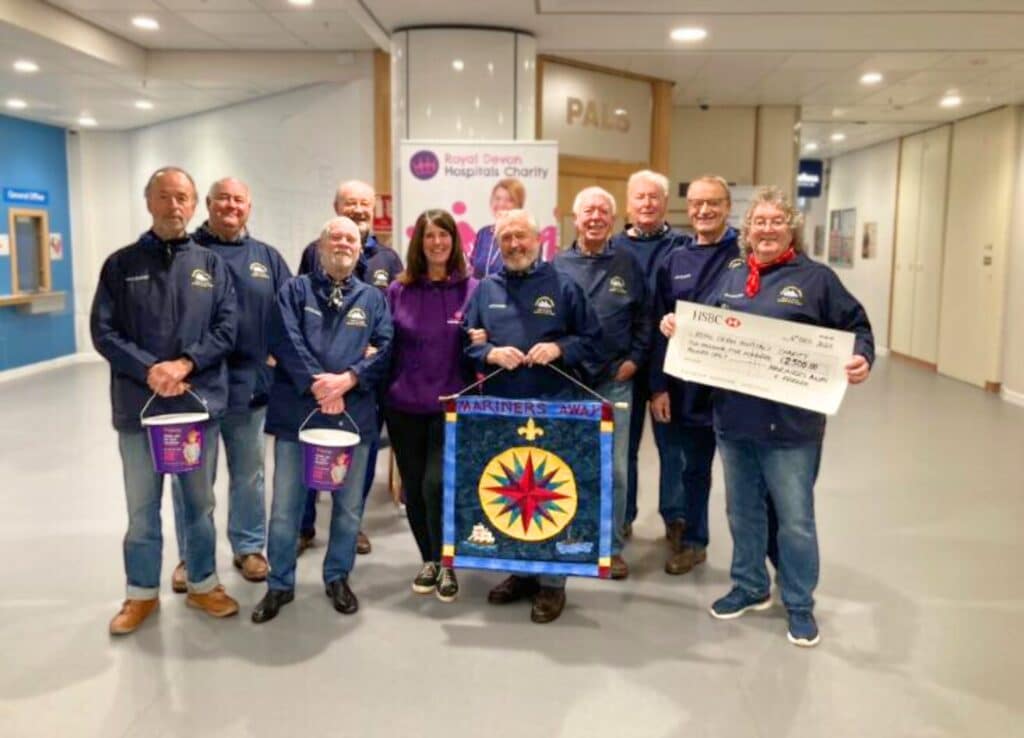 Members of Mariners Away present their fundraising cheque to Royal Devon Hospitals Charity community fundraiser, Debbie Allen, at the Royal Devon and Exeter Hospital.