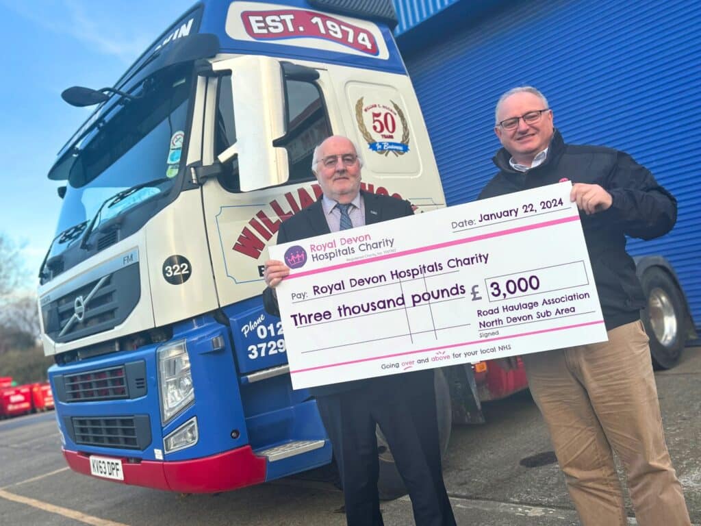 Bill Hockin presents the Road Haulage Association cheque to Ian Roome of Royal Devon Hospitals Charity