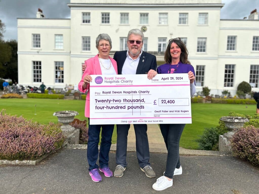 Exeter Golf and Country Club men’s and ladies’ captains Geoff Fidler and Vicki Rogers present their fundraising cheque to Debbie Allen, community fundraiser at Royal Devon Hospitals Charity.