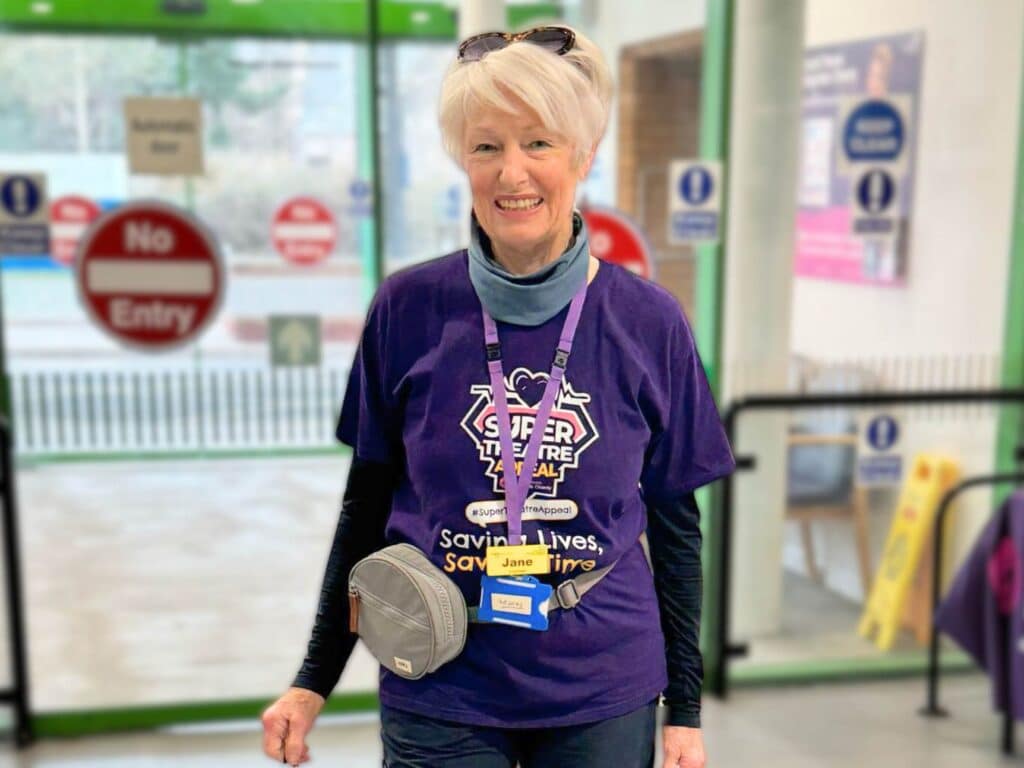 Hospital meet and greet volunteer Jane Morton completes her super 80-mile walking challenge at the Royal Devon and Exeter Hospital.