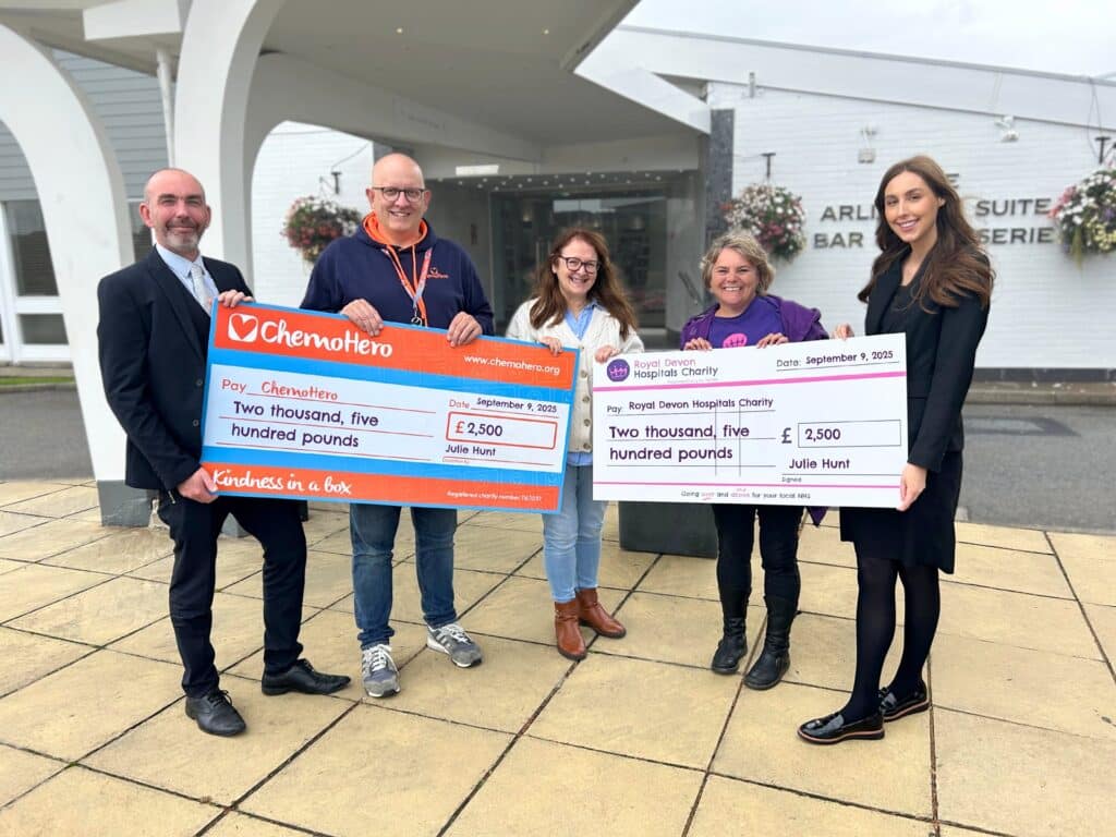 Councillor Julie Hunt presents the money raised at the Casino Royale Gala to Rob Wallis from ChemoHero and Julie Whitton from Royal Devon Hospitals Charity, with Martyn Hawes and Darcie Downs from The Barnstaple Hotel. Picture: Royal Devon Hospitals Charity