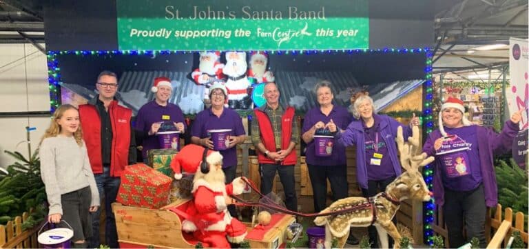 Fern Centre staff and volunteers join staff from St John’s Garden Centre for the unveiling of this year’s Santa Band.