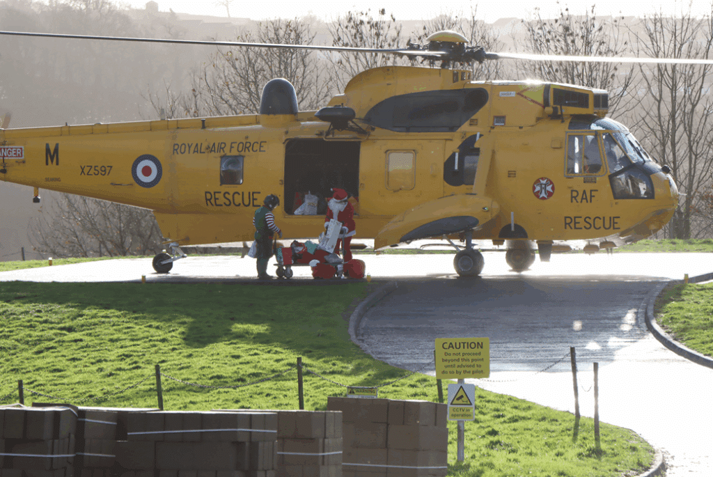 The Sea King helicopter  lands at North Devon District Hospital.