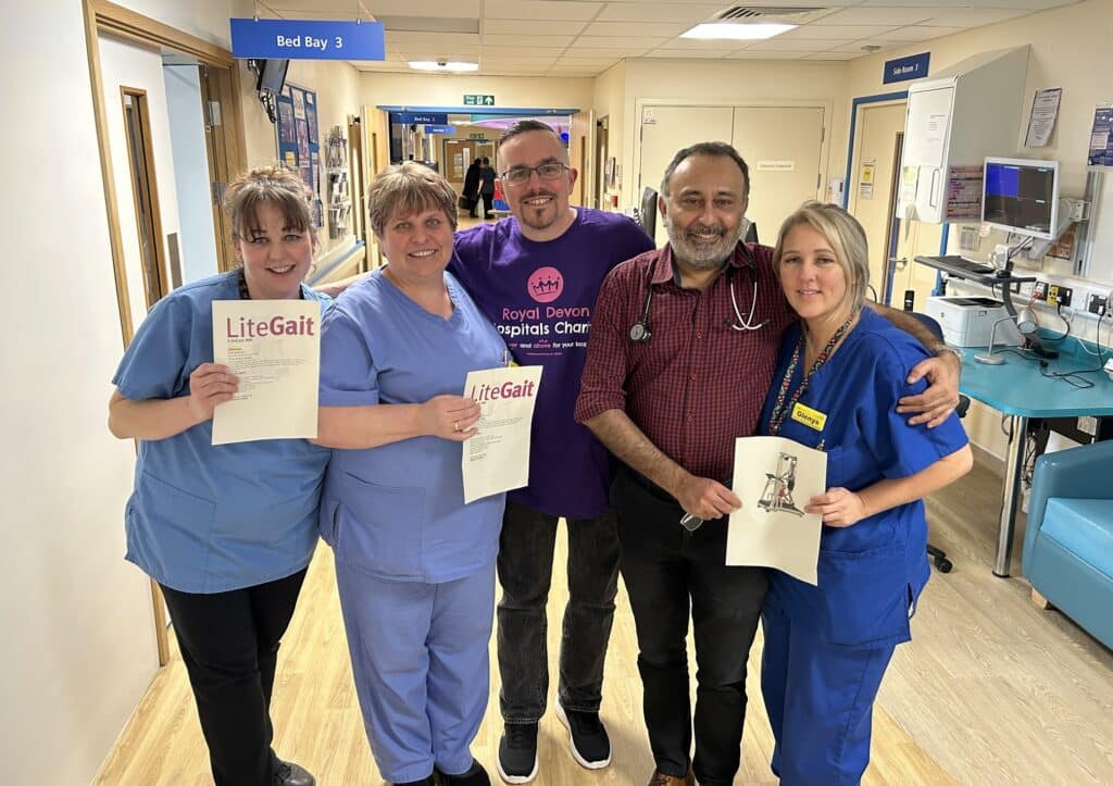 Grateful patient: Stroke survivor Reuben Herbert is pictured back on Staples Ward with Dr Riaz Latif, Clinical Stroke Nurse Specialist Glenys Dann, Healthcare Assistant Iwona Grabusinska and member of the domestic team Rebecca Dickinson